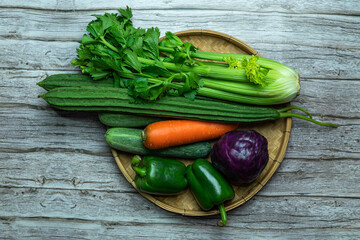 fresh vegetables on wooden table