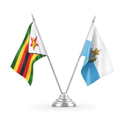 San Marino and Zimbabwe table flags isolated on white 3D rendering