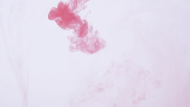 drop red ink paint in water slow motion