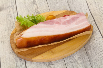 Smoked pork breast with salad leaves