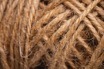 Natural rope twine textured background close up plan. Fibers in a mess rustic style