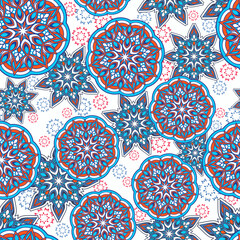 Seamless paisley mandala pattern with folk geometric flowers. Indian stylized floral texture for textile or wrap. Festival oriental background with mehendi doodle hand drawing