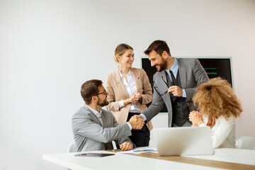 Multiethnic young business people working together in the office