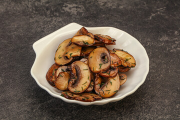 Roasted champignon with herbs and spices