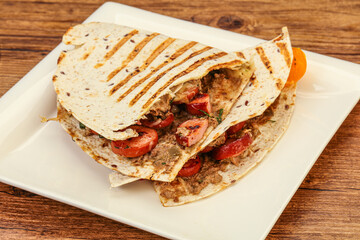 Quesadilla with sausages and beans