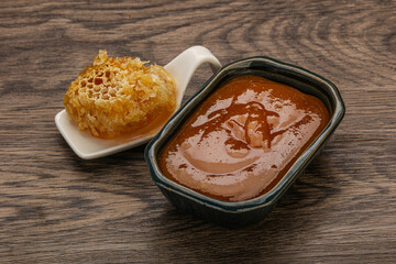 Natural honey in the bowl