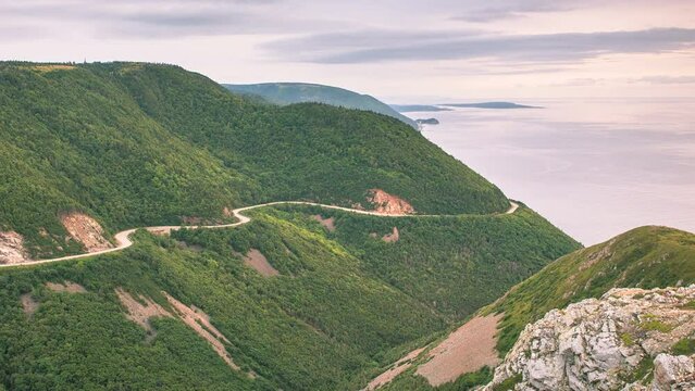 Panoramic view of the mountains and the winding roads of the scenic and world famous Cabot Trail as seen from Skyline Trail, Cape Breton, Nova Scotia