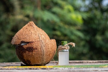 Organic Coconut and Coconut Water in a Small Glass Jar with Copy Space for Texts Writing