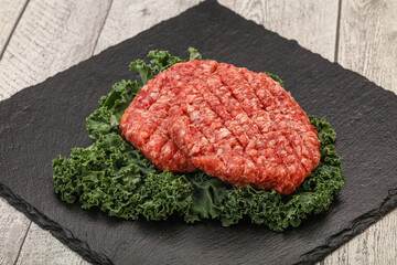 Raw beef burger cutlet for cooking
