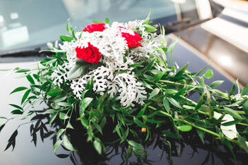Wedding car decorated with beautiful, luxury flowers