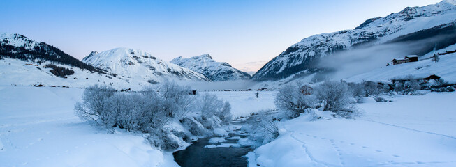 Fototapeta na wymiar Panoramic winter landscape of the Dolomites mountains in northeastern Italy