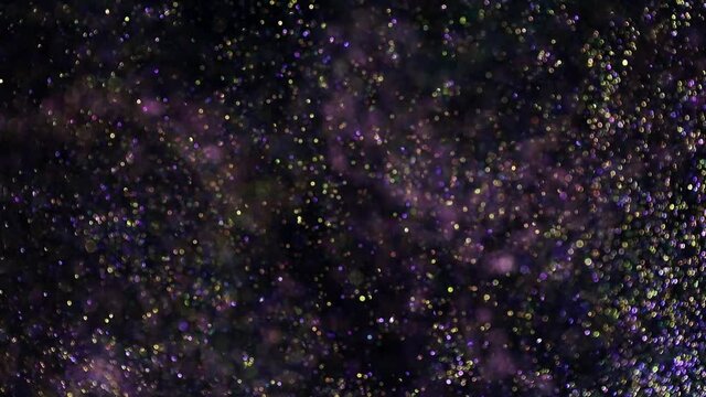 Festive twinkle glitters background video. Abstract sparkle backdrop with circles in motion. Footage with flickering liquid particles. Colored and bright fluent animation with blur effect