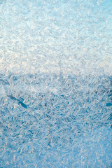 Beautiful frost ornaments on the window