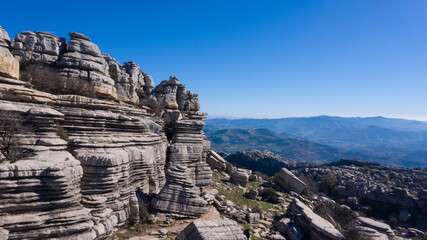 Naklejka premium Karstic stone towers formations in Torcal de Antequera, Andalusia, Spain