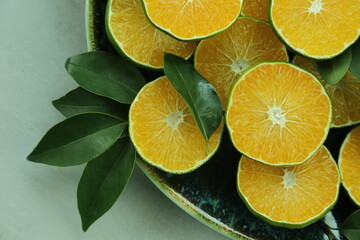 Green sweet tangerines growing with background