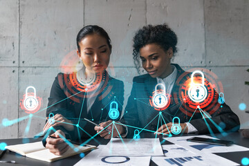 Two businesswomen work together in modern office on new project. Double exposure. Concept of...