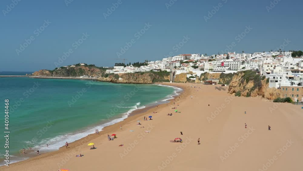 Sticker Tourist portuguese city of Albufeira, pescadores summer beach, with tourists. Algarve.