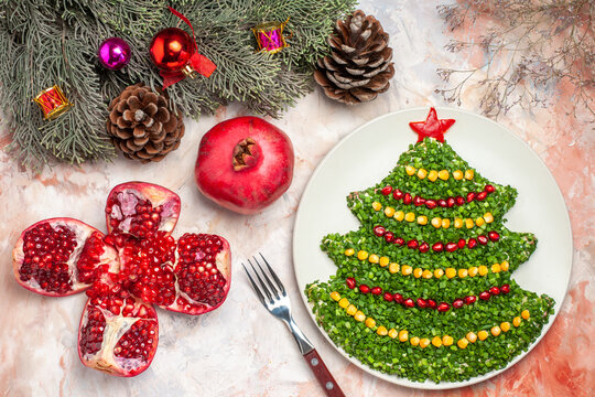 top view tasty green salad in new year tree shape on light background meal health xmas color holiday photo