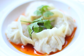 Delicious dim sum on a beautiful white plate