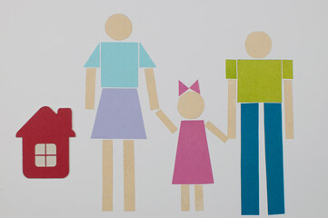 Closeup of happy paper family on white background