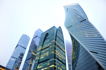 Naklejka premium view of tall office buildings in the city