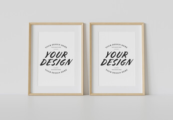 2 Wooden Frames Leaning on White Wall Mockup