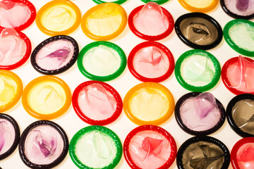 Colorful condoms background.