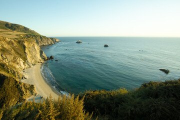 Monterey County, CA - USA - Aug. 19, 2020: A dramatic landscape view of the sunset along Big Sur. A rugged and mountainous section of the Central Coast of California