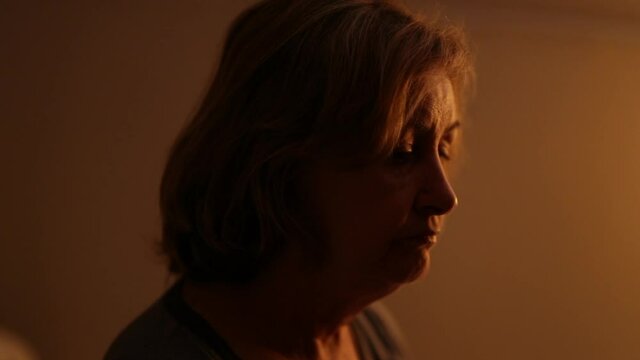 Older Woman Preoccupied At Night Feeling Anxiety And Worry Before Sleep