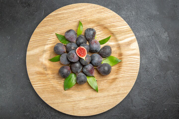 top view fresh sweet figs inside plate on dark background tree fruit dark taste photo