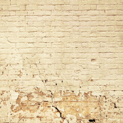 Yellow Grunge Peeling Wall Close-up. Old Damaged Broken Mortar Background.