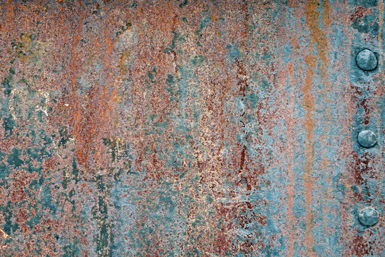 Retro Rusty Metal Wall Background. Old Scratched Paint Texture. Rough Grunge Iron Material. © Polina Zait