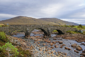 Fototapeta na wymiar The old bridge at Sligachan on the Isle of Skye