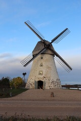 Fototapeta na wymiar Windmill of the last century in the Latvian village of Arishi on November 6, 2020