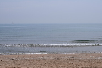 Lonely beach with calm waters