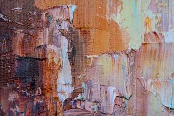 Macro. Abstract art. Expressive embossed pasty oil paints and reliefs. Colors: yellow, white, ocher, brown.