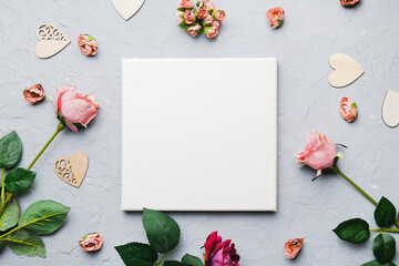 Valentine day concept. Blank canvas board for romantic message. Mockup poster, hearts and flowers...