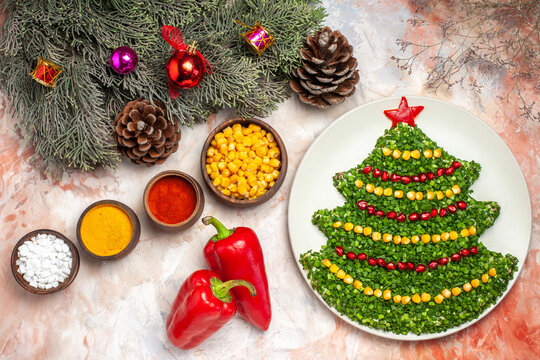 top view tasty green salad in new year tree shape with seasonings on light background xmas color salad meal photos