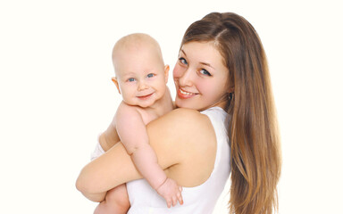 Portrait of happy smiling mother and baby playing together over a white background