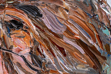 Embossed pasty oil paints and reliefs. Primary colors: ocher, white, brown, orange.  Abstract art.