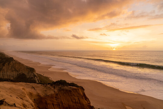 beautiful sunset with beach and sand dunes on the Alentejo coast of Portugal © makasana photo