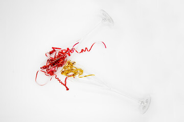 Two champagne glasses with a 
serpentine