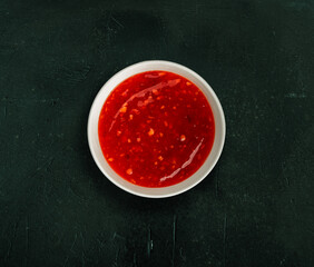 Sweet chili sauce in a white bowl