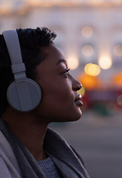 Profile Serene Young Woman With Headphones Looking Away