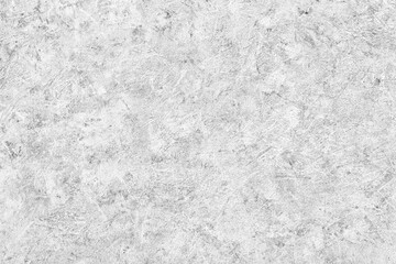 Fototapeta na wymiar Abstract light grey plastered textured grunge background in the form of a rough covered stucco wall, closeup