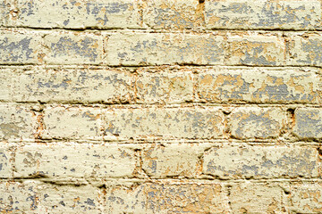 Texture of a brick wall with cracks and scratches which can be used as a background