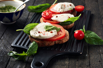 Open caprese sandwiches.