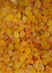many yellow raisins in close up