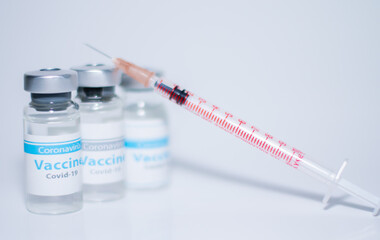 A single bottle vial of Covid-19 coronavirus vaccine in a research medical lab. 