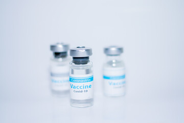 A single bottle vial of Covid-19 coronavirus vaccine in a research medical lab. 
